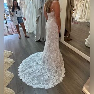 Wedding dress bought as a second dress and never wore.